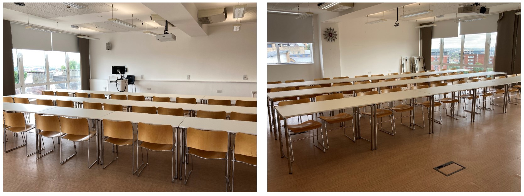 Chairs and tables in rows facing the teaching wall.